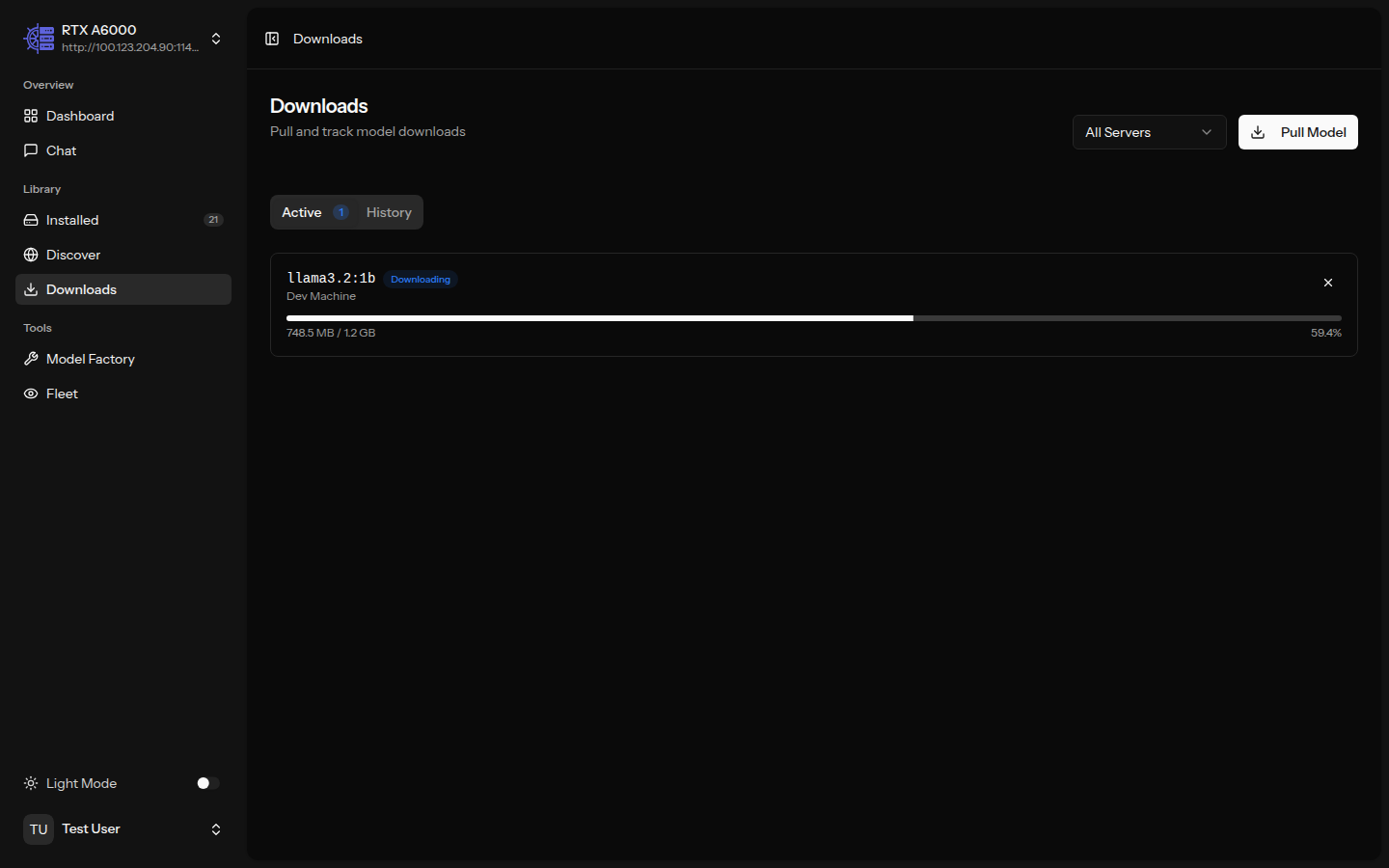 Download manager showing model pull progress with speed and ETA